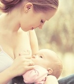 Young breastfeeding mother